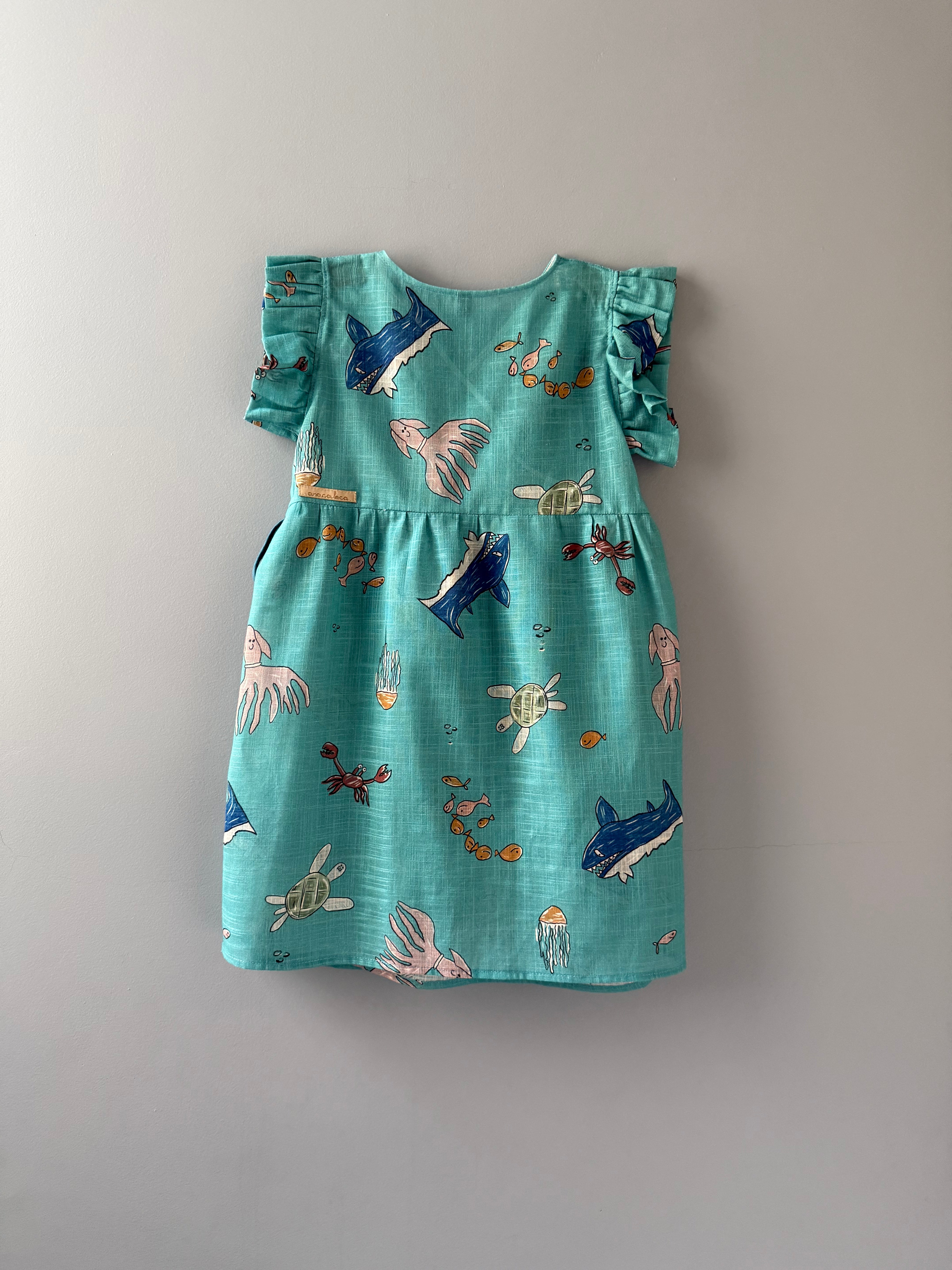 Vestido transpasse fundo do mar