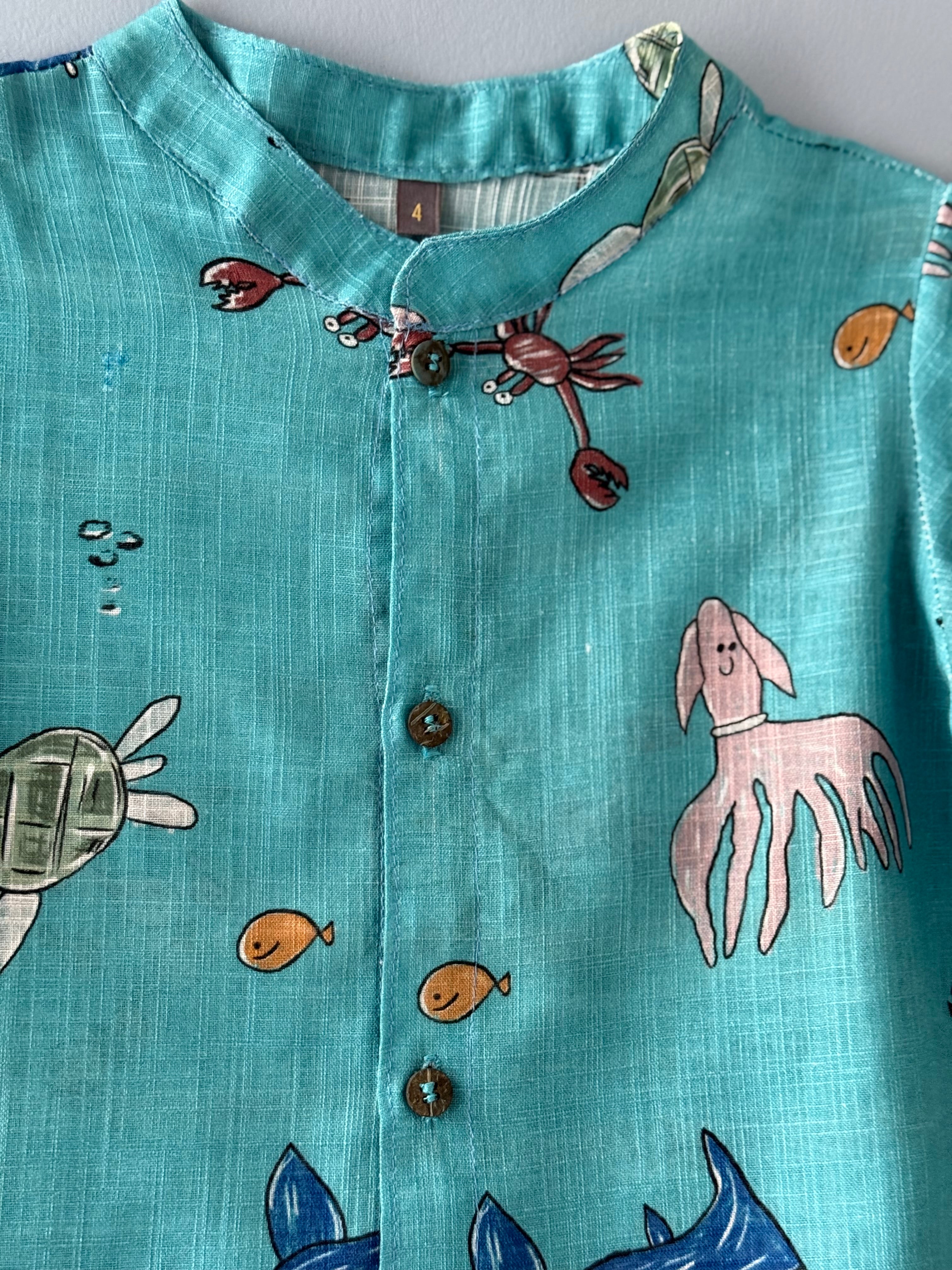 Camisa fundo do mar