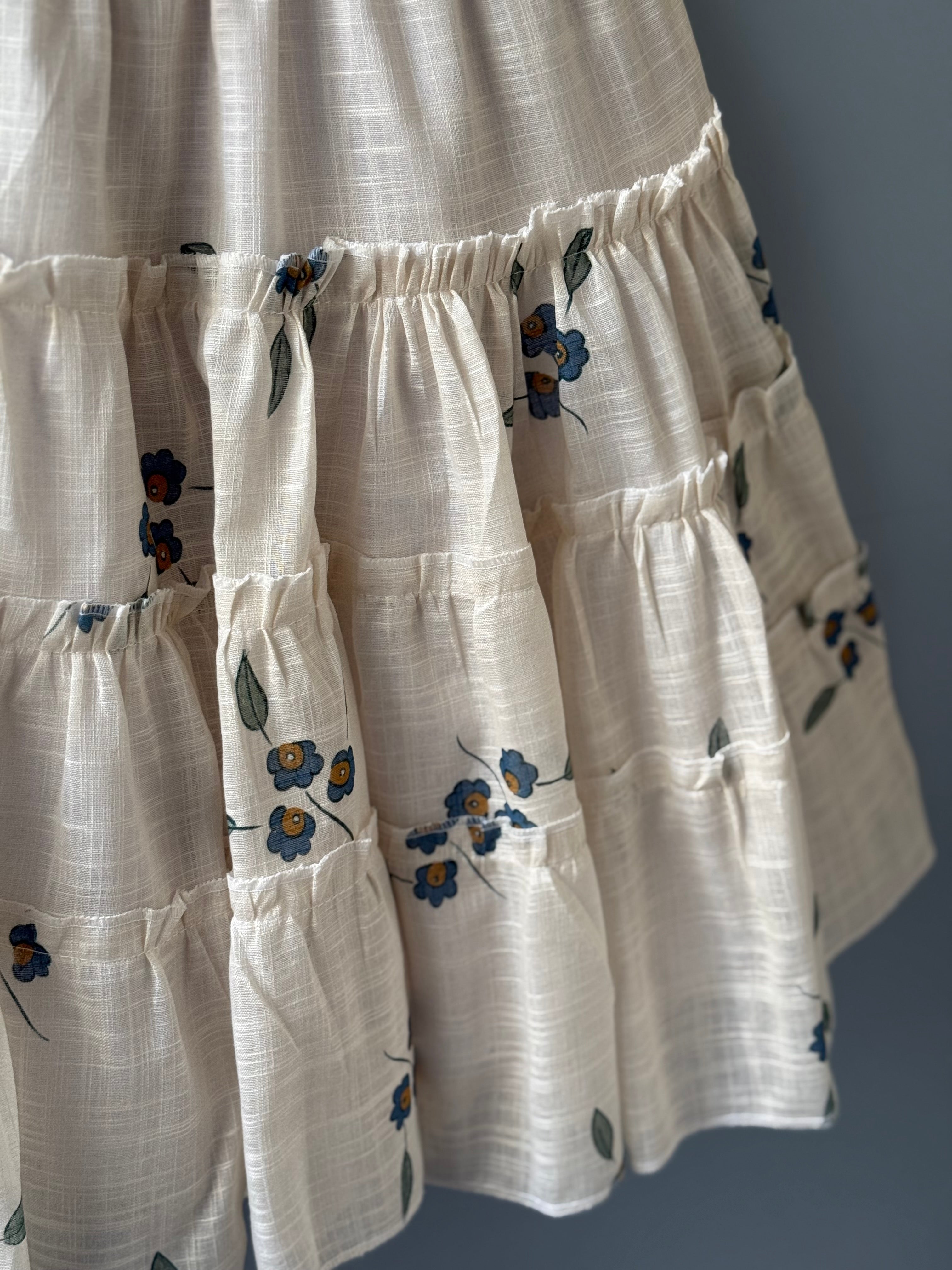 Conjunto top ombrinho e saia rodada